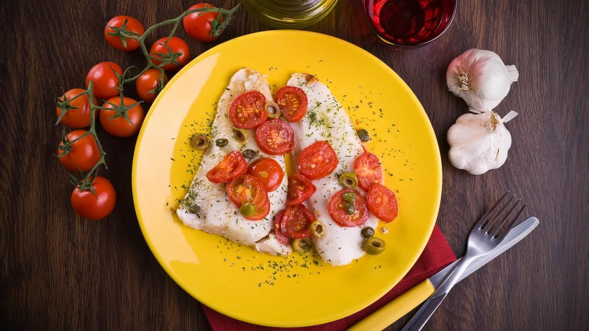 Nasello al forno con pomodorini